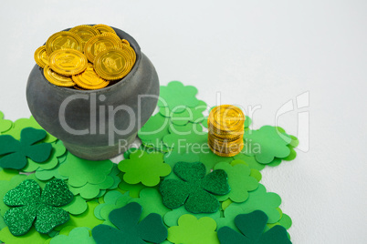 St. Patricks Day shamrocks and pot filled with chocolate gold coins