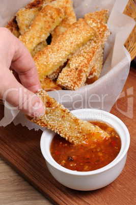 Cheese bread sticks in sesame