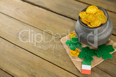 St. Patricks Day shamrock, flag and pot filled with chocolate gold coins