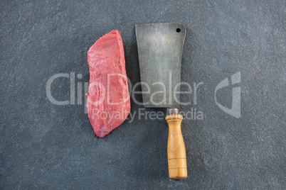 Beef steak and cleaver