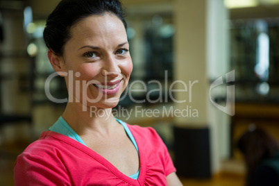 Portrait of happy female trainer