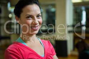 Portrait of happy female trainer