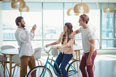 Business executives with bicycle