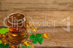 Mug of beer, chocolate gold coins and shamrock for St Patricks Day