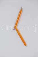 Broken pencil on white background