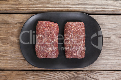 Minced beef in wooden tray