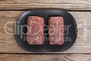 Minced beef in wooden tray