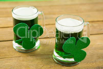St Patricks Day two mugs of green beer with shamrock