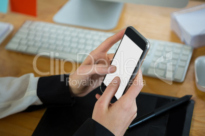 Close-up of woman using mobile phone