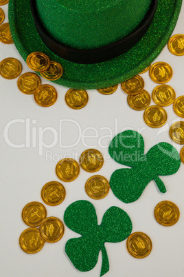 St. Patricks Day leprechaun hat, shamrocks and chocolate gold coins