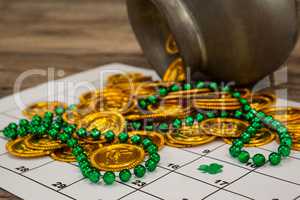 St. Patricks Day chocolate gold coins and beads kept on calendar