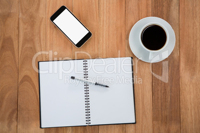 Coffee with organizer and mobile phone