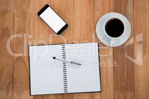 Coffee with organizer and mobile phone