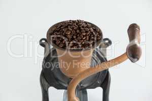 Vintage coffee grinder with coffee beans