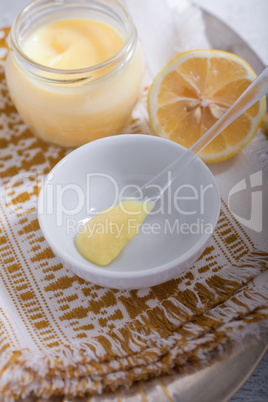 Lemon kurd with a spoon