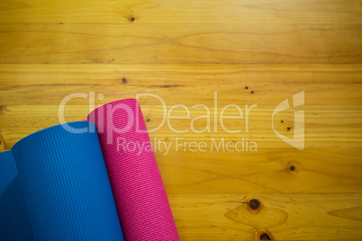 Exercise mat kept on wooden floor