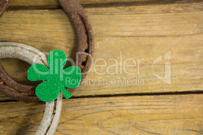 St Patricks Day shamrock with two horseshoes