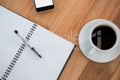 Coffee with organizer and mobile phone