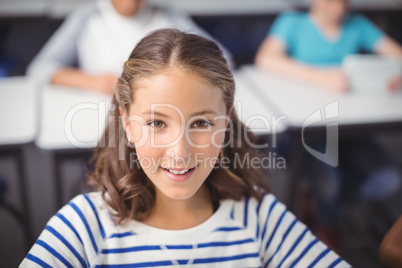 Portrait of smiling schoolgirl