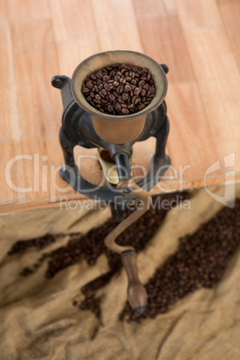 Coffee grinder with coffee beans inside