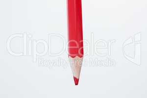 Red color pencil on white background