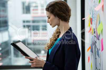 Woman using digital tablet