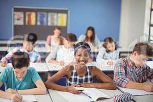 Students studying in classroom