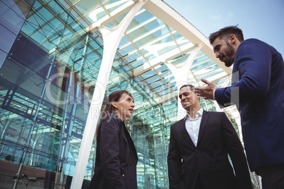 Businesses executives interacting with each other outside platform