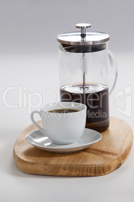 Cafetiere and a cup of black coffee