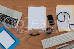 Clipboard with keyboard and mouse on table