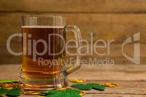 Mug of beer, chocolate gold coins and shamrock for St Patricks Day