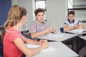 Students studying in classroom