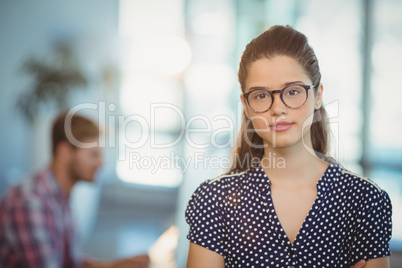 Portrait of female business executive wearing spectacles