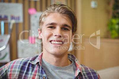 Smiling executive in office