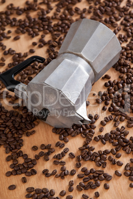 Metallic coffee maker with coffee beans