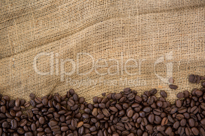 Coffee beans arranged on sack