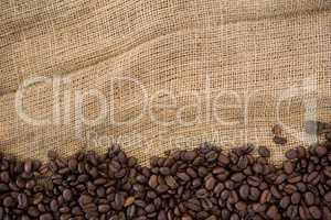 Coffee beans arranged on sack