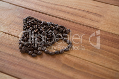 Coffee beans forming cup shape