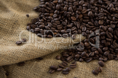Roasted coffee beans on sack