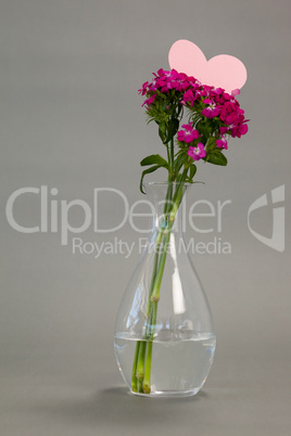 Flower vase with blank heart shape card