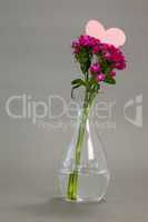 Flower vase with blank heart shape card