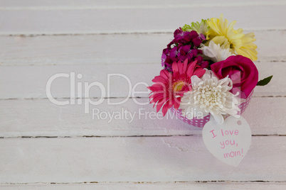 Bunch of fresh flowers with I love you mom card