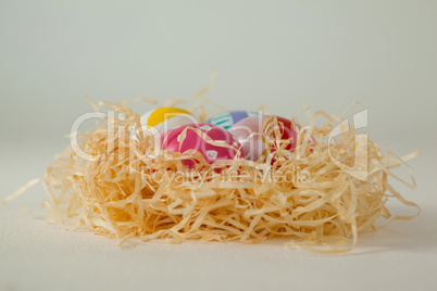 Painted easter eggs in nest