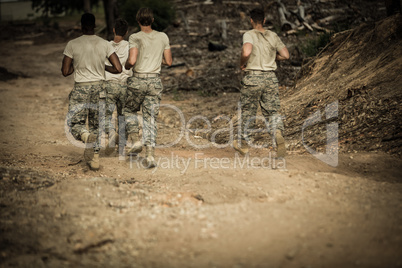 Soldiers running in boot camp