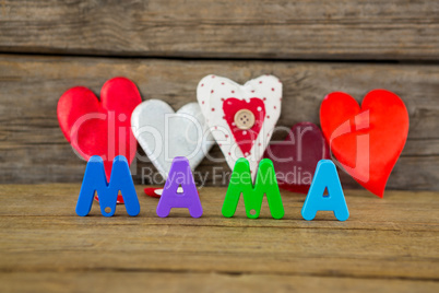Heart shape with alphabet reading mama
