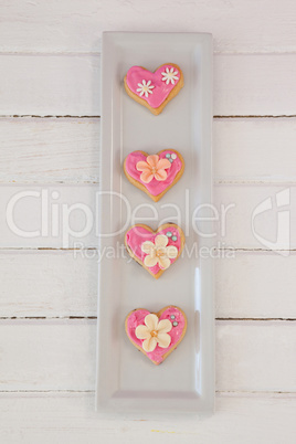 Heart shape cookies arranged in a row