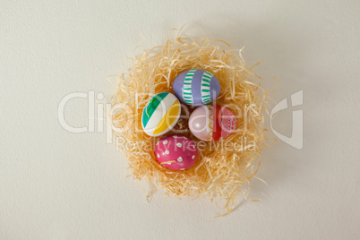 Painted easter eggs in nest