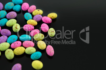 Multicolored Easter eggs on black background Multicolored Easter eggs on black background