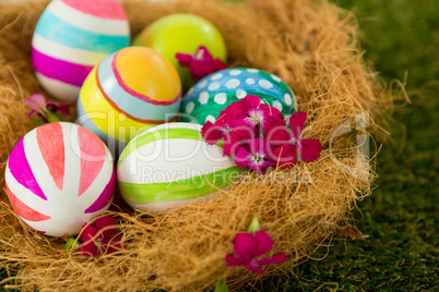 Painted Easter eggs in the nest