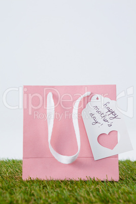 Happy mothers day card on paper bag
